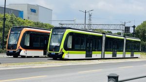 PVG_Lingang_DRT_Trams_14&19_@_Feidu_Road,_2023-09-02